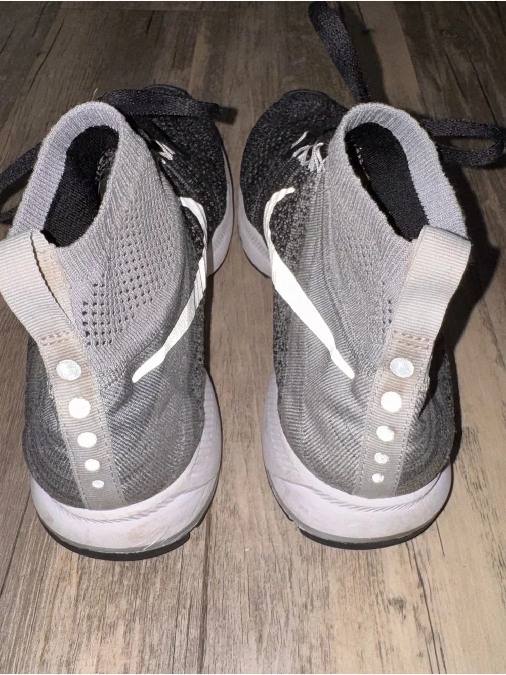 Nike Kids Black and Gray Flyknit High-Top Sneakers with White Swoosh